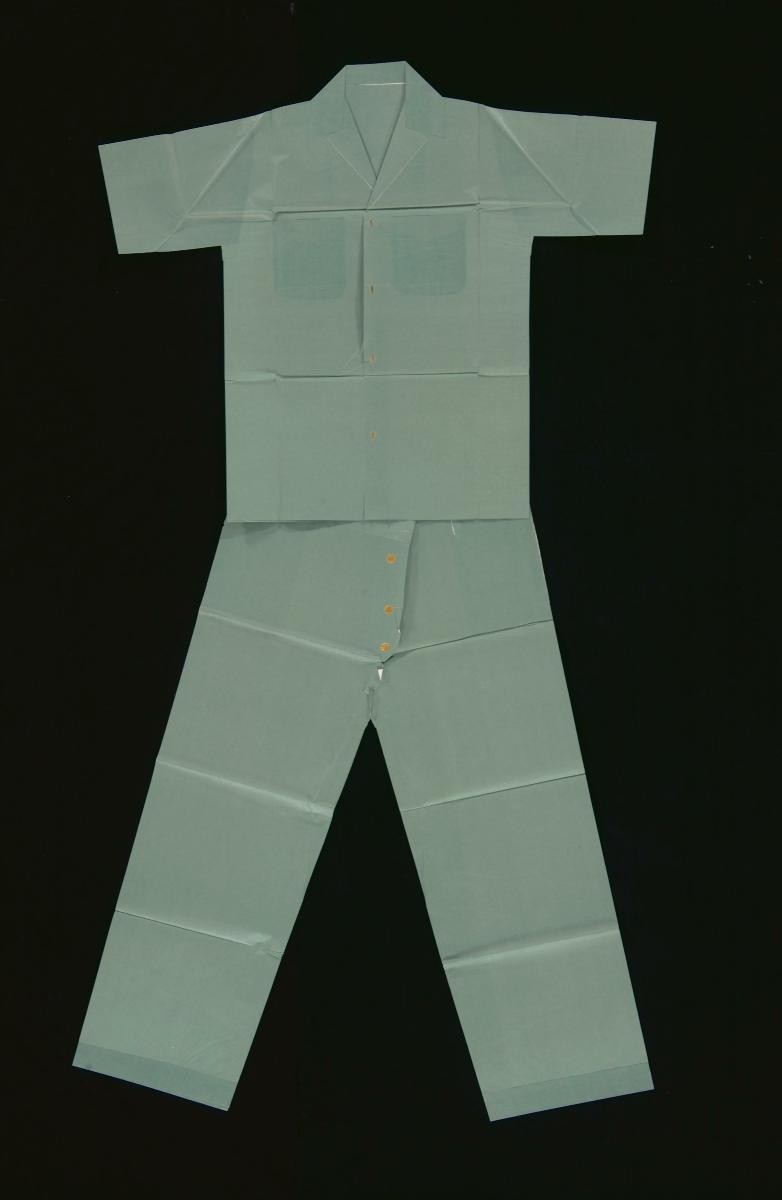 A set of green paper shirt and pants