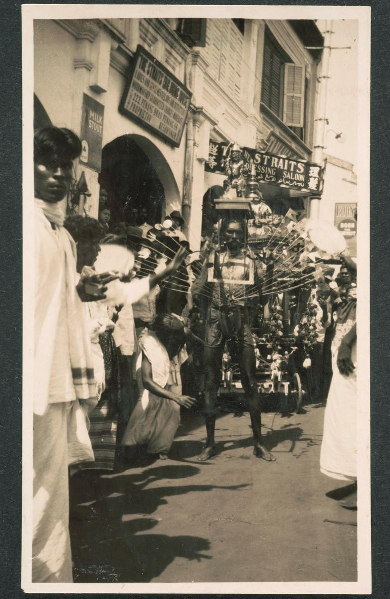 A devotee carrying a kavadi during a Thaipusam procession