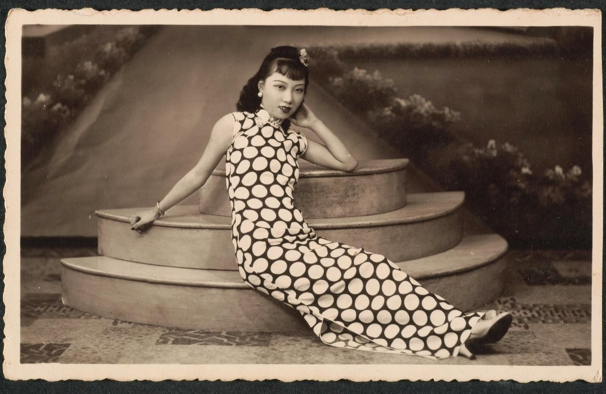 Portrait of a Chinese woman wearing a sleeveless cheongsam