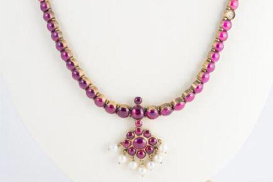 <a class="bold" href="/assets/02329e07-aa07-4af4-b54d-32310c2ff1d4/xlf7cwi.JPG" target="_blank">
An <i>addigai </i>or necklace collected by Samuel Dhoraisingam and Kamala Devi Dhoraisingam in their efforts to document Chetti Melaka heritage
</a>