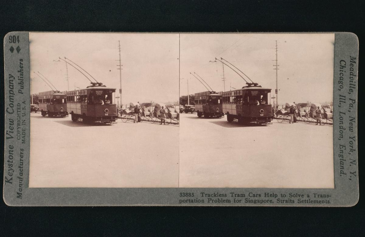 A stereoview of trolley buses
