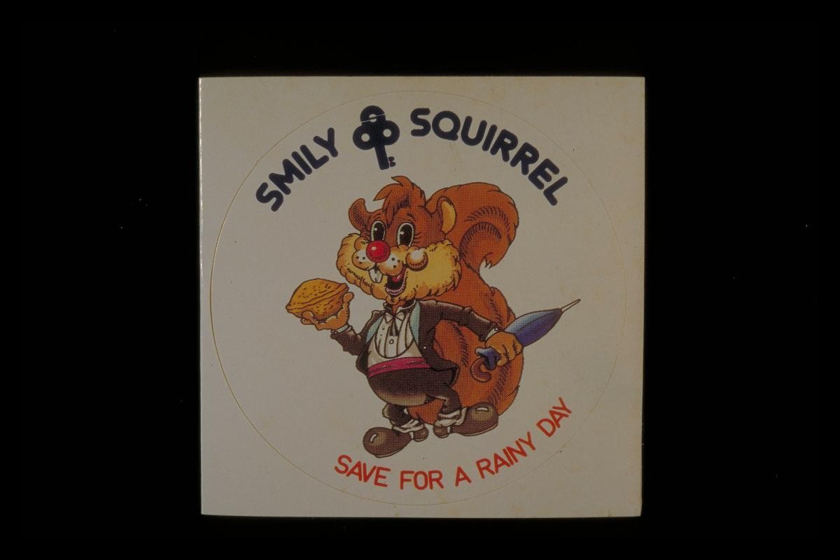 ‘Smiley Squirrel’ sticker with slogan, ‘Save for a rainy day’