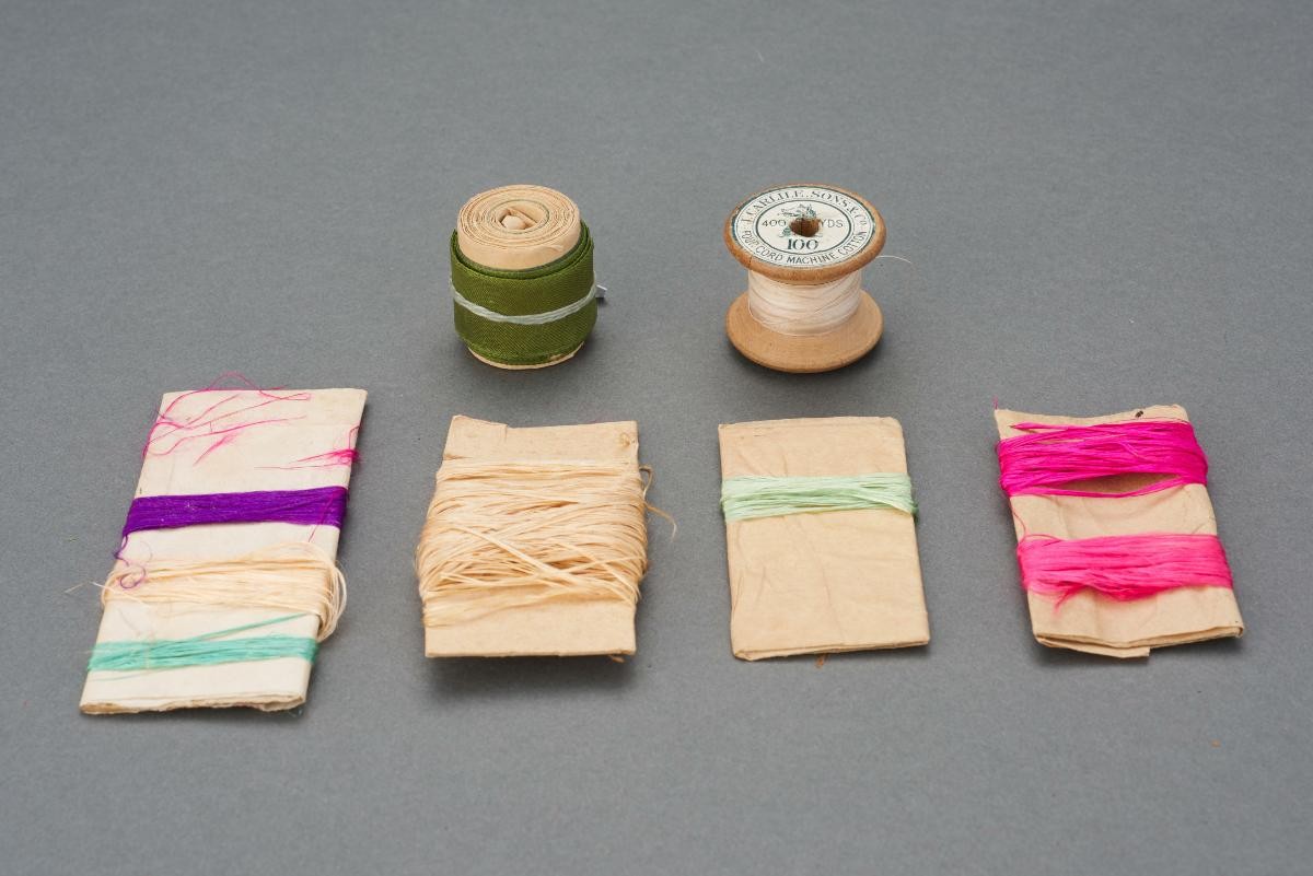 2 spools and 4 cardboard reels of silk thread