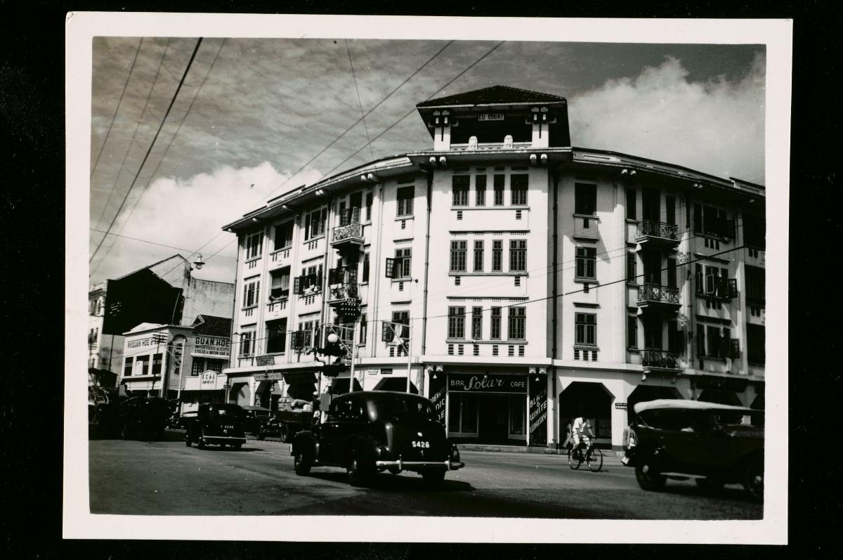 Shophouses along a busy street