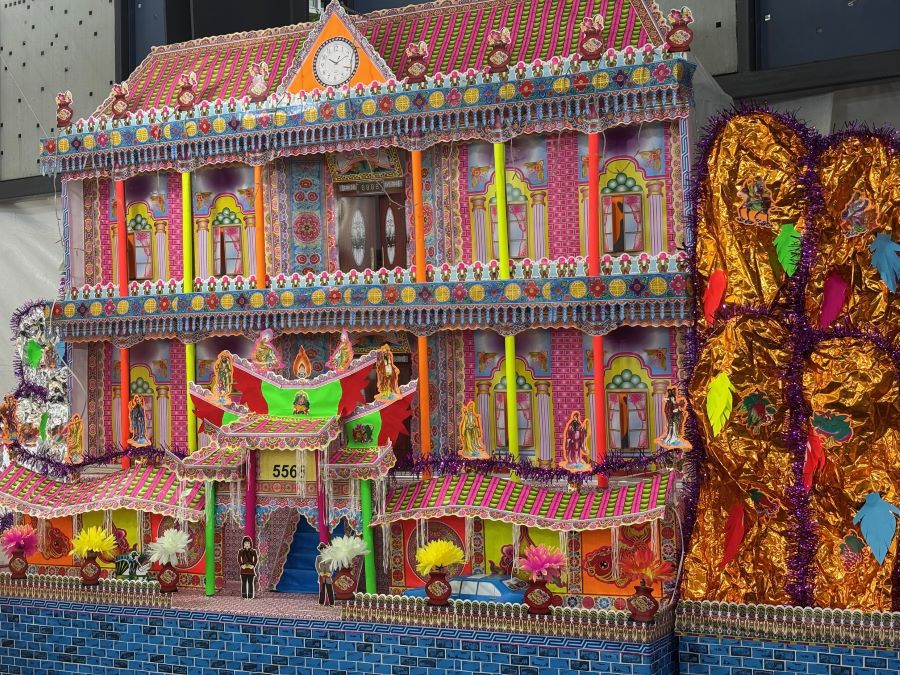 Paper model as an offering to be burnt during a Taoist funeral procession, as grand home for the afterlife.
