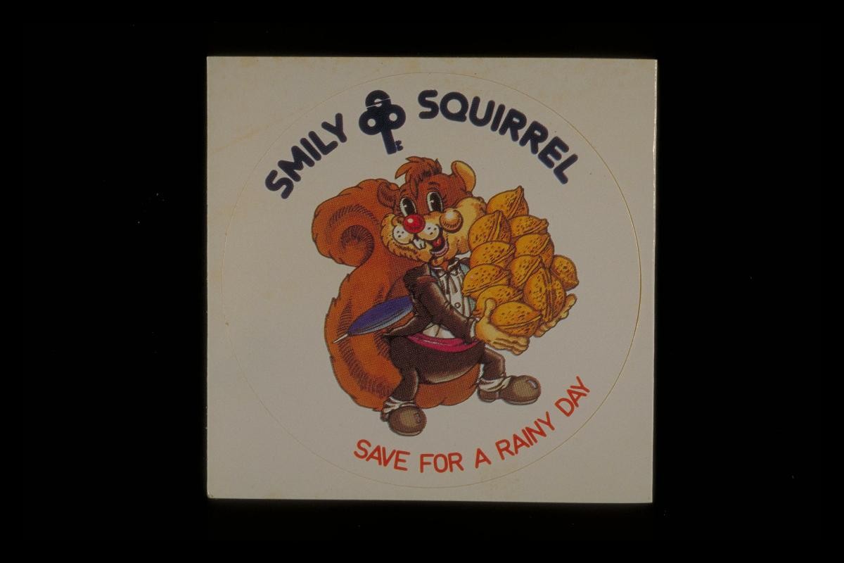 ‘Smiley Squirrel’ sticker with slogan, ‘Save for a rainy day’