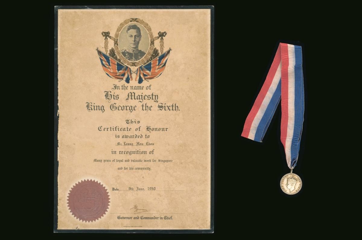 Medal with an accompanying certificate of honour awarded by King George VI to Neo Tiew