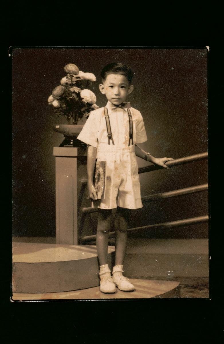 Studio portrait of a Chinese boy