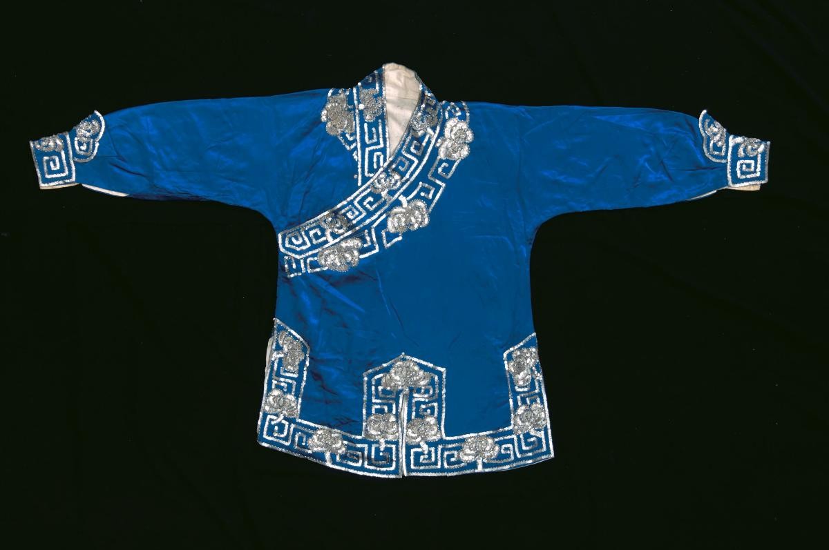 A blue top with silver floral sequins worn by a ‘wu dan’ in a Chinese opera