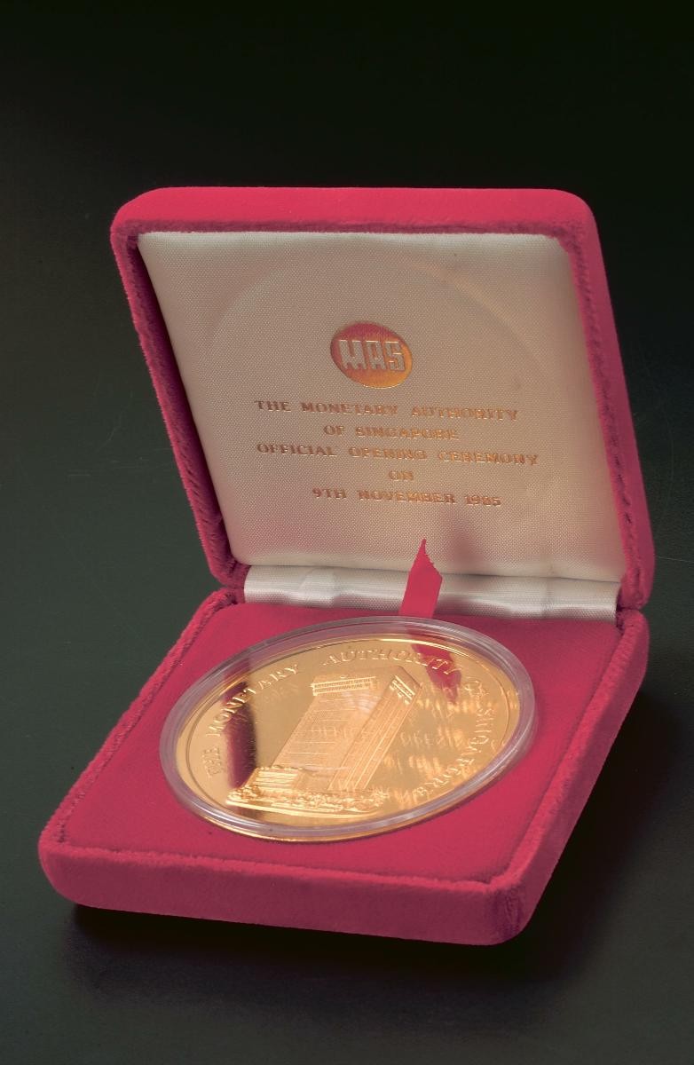 Medal presented to Mr Lim Kim San at Monetary Authority Singapore's (MAS) official opening ceremony