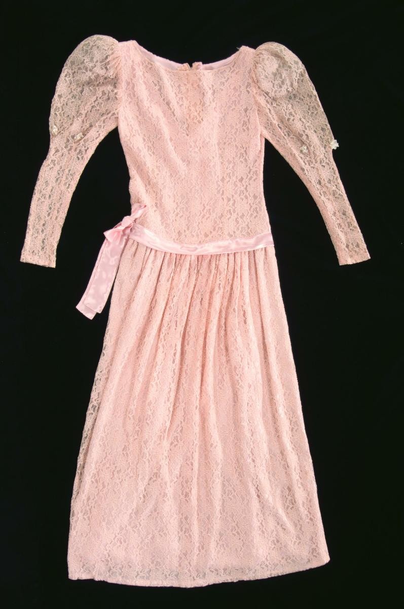 A pink lace wedding dress