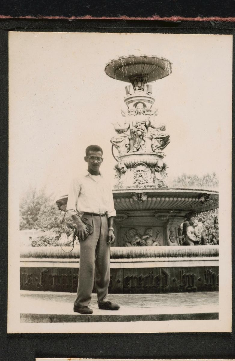 A man at the Tan Kim Seng fountain