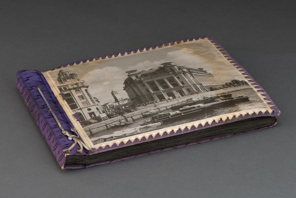 Personal photograph album titled "Sixteen Months in Singapore"
