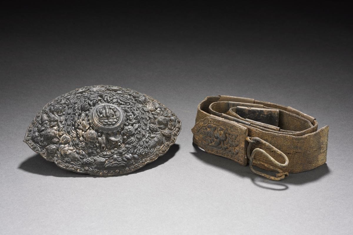 A silver buckle and belt exhumed from Bukit Brown Cemetery, peg no. 2976