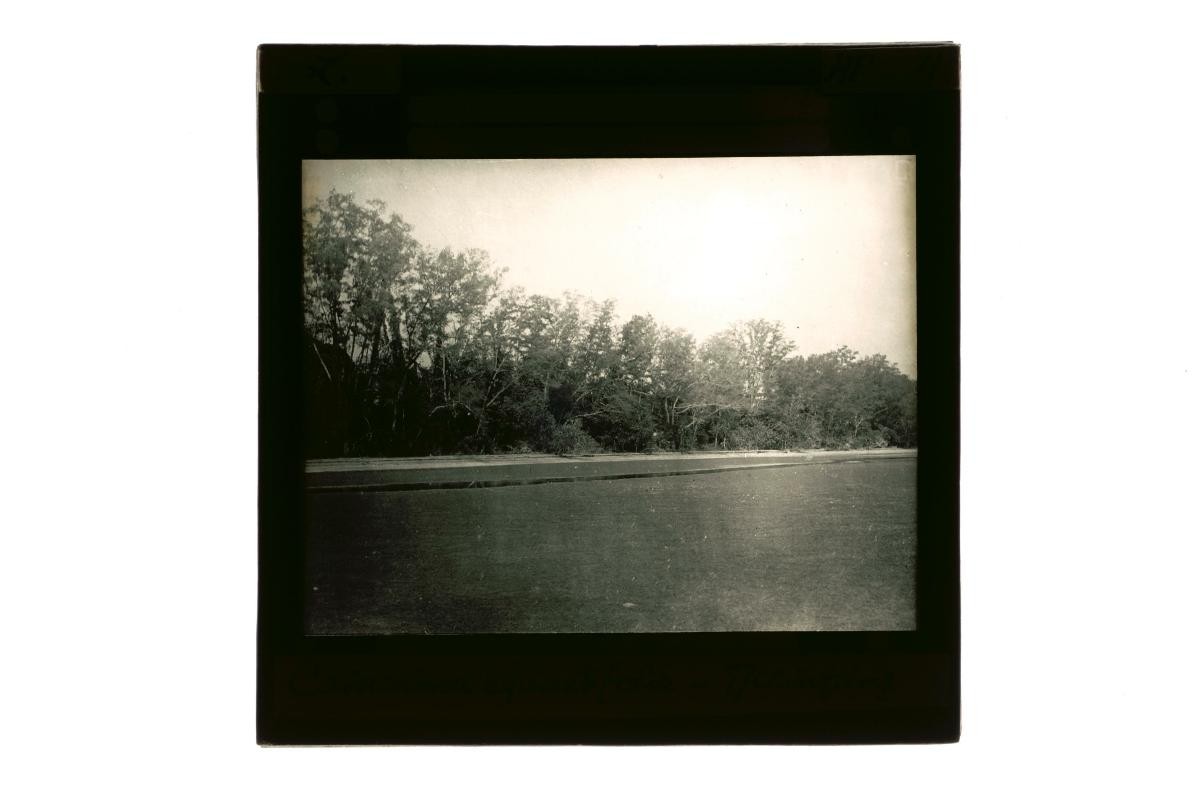 A glass lantern slide depicting a coastal scene