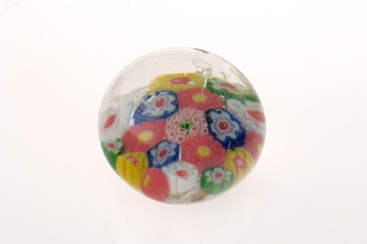 Glass paperweight with floral design