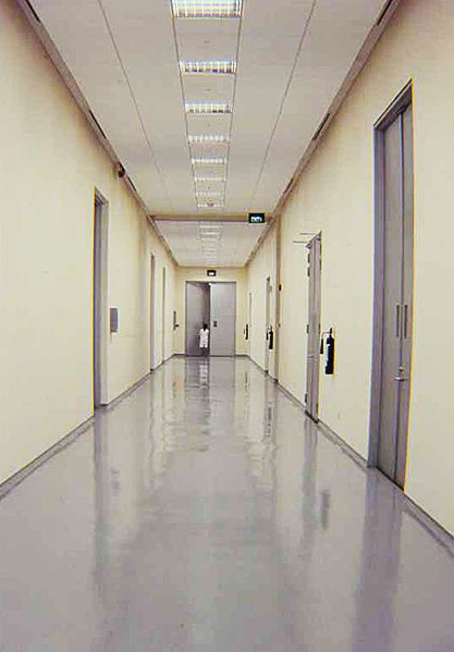 <p style="color: #000000; margin: 0cm 0cm 8pt;">The long corridor with the 3.5m by 2.3m steel door (one of the largest steel doors in Singapore) at the entrance on Level 1.