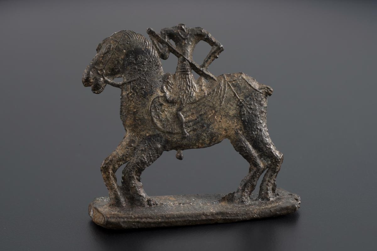 Figurine - a rider on a horse - excavated from Empress Place site on 8 May 1998.