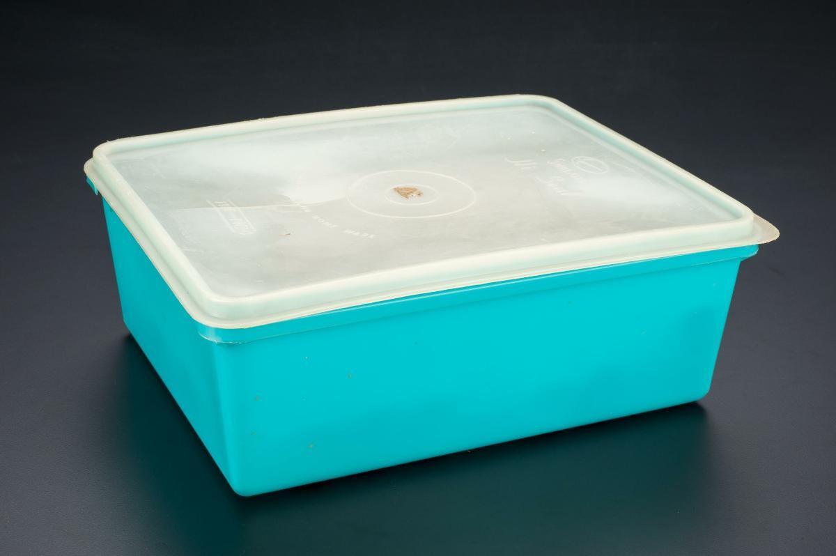 A plastic box full of threads