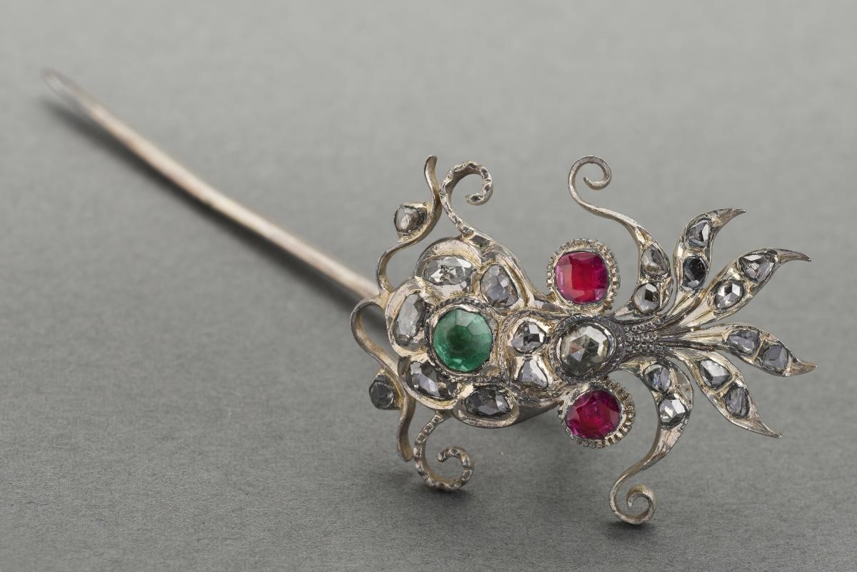 Silver hairpin with red and green stones