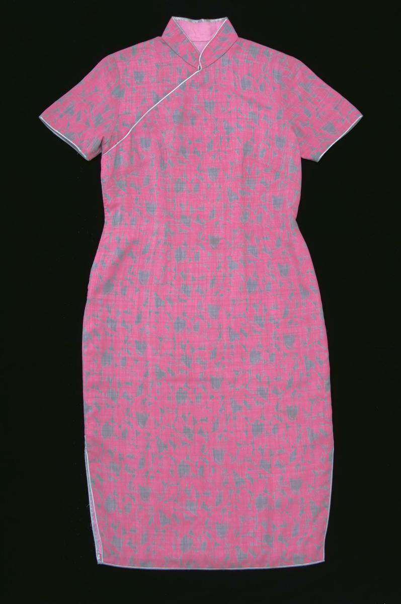 Fuchsia cheongsam with floral motifs worn by Kwa Geok Choo