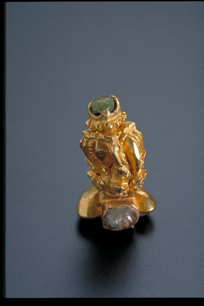 Ornament with stones on hoop and decorated vertical motif