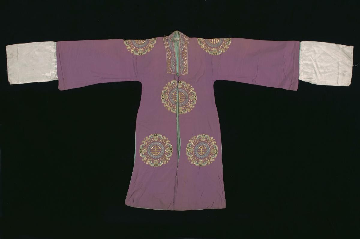 A purple robe with gold and blue motifs worn by a ‘wen xiao sheng’ in a Chinese opera