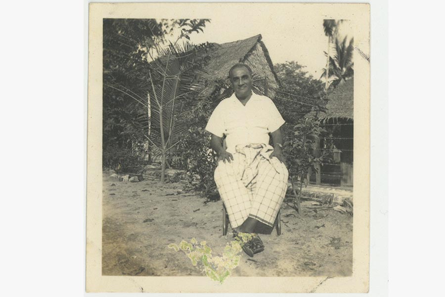 <a class="bold" href="/assets/50b931c8-8967-40b6-85bd-8a3c413fa61a/vii-a-photograph-of-mt-pillay-in-a-checkered-sarong.jpg" target="_blank">
A photograph of MT Pillay in a checkered sarong
</a>