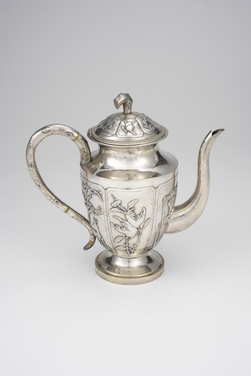 Chinese export silver coffee pot with floral and foliate motifs