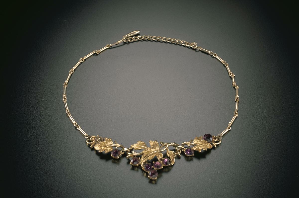 Necklace adorned with purple diamanté that belonged to a notable women's rights activist