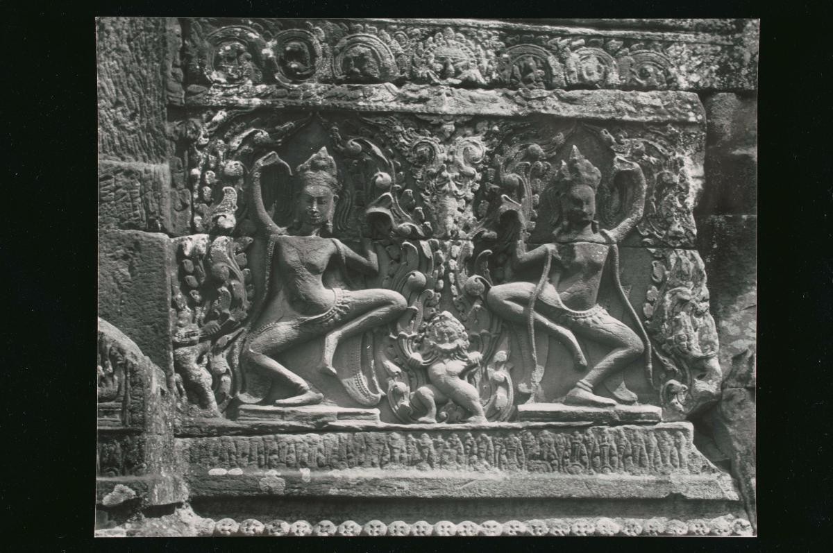 A view of a temple relief in Angkor by Loke Wan Tho