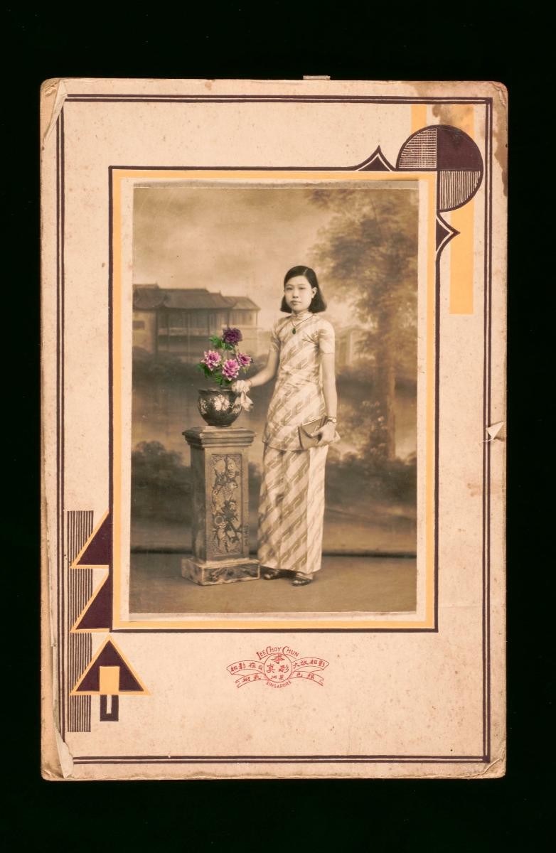 Studio portrait of a young Chinese woman