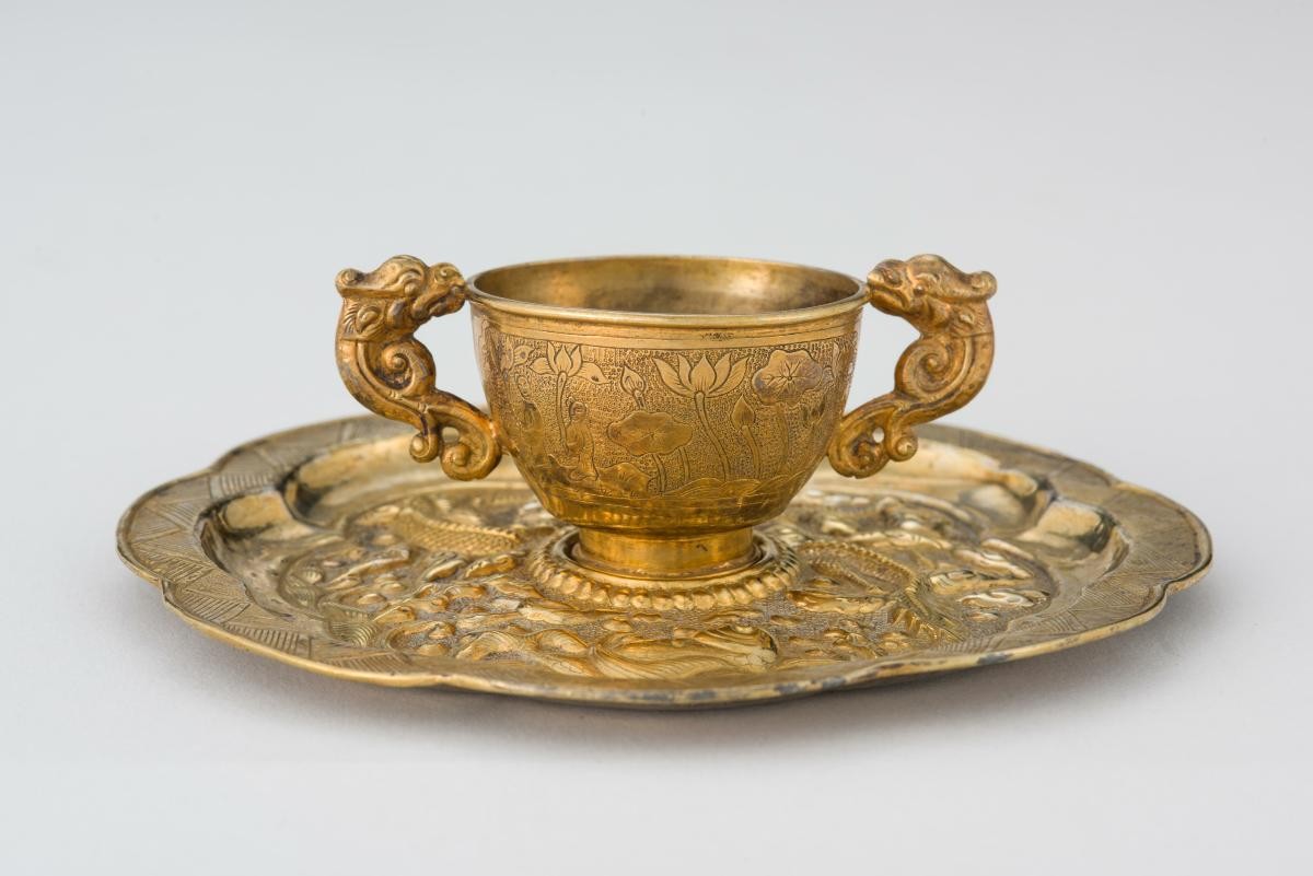 Cup with saucer