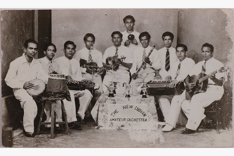<a href="/assets/b8d43938-549d-4faa-acbf-2f0870cea029/4c-b183.jpg"><strong>Photograph of Singapore Indian Music Party (SIMP) and the Edmund Appau Family band</strong></a><br>
1940s–1950s and 1970s, Singapore<br>
<em>Collection of the Family of Edmund Appau</em>