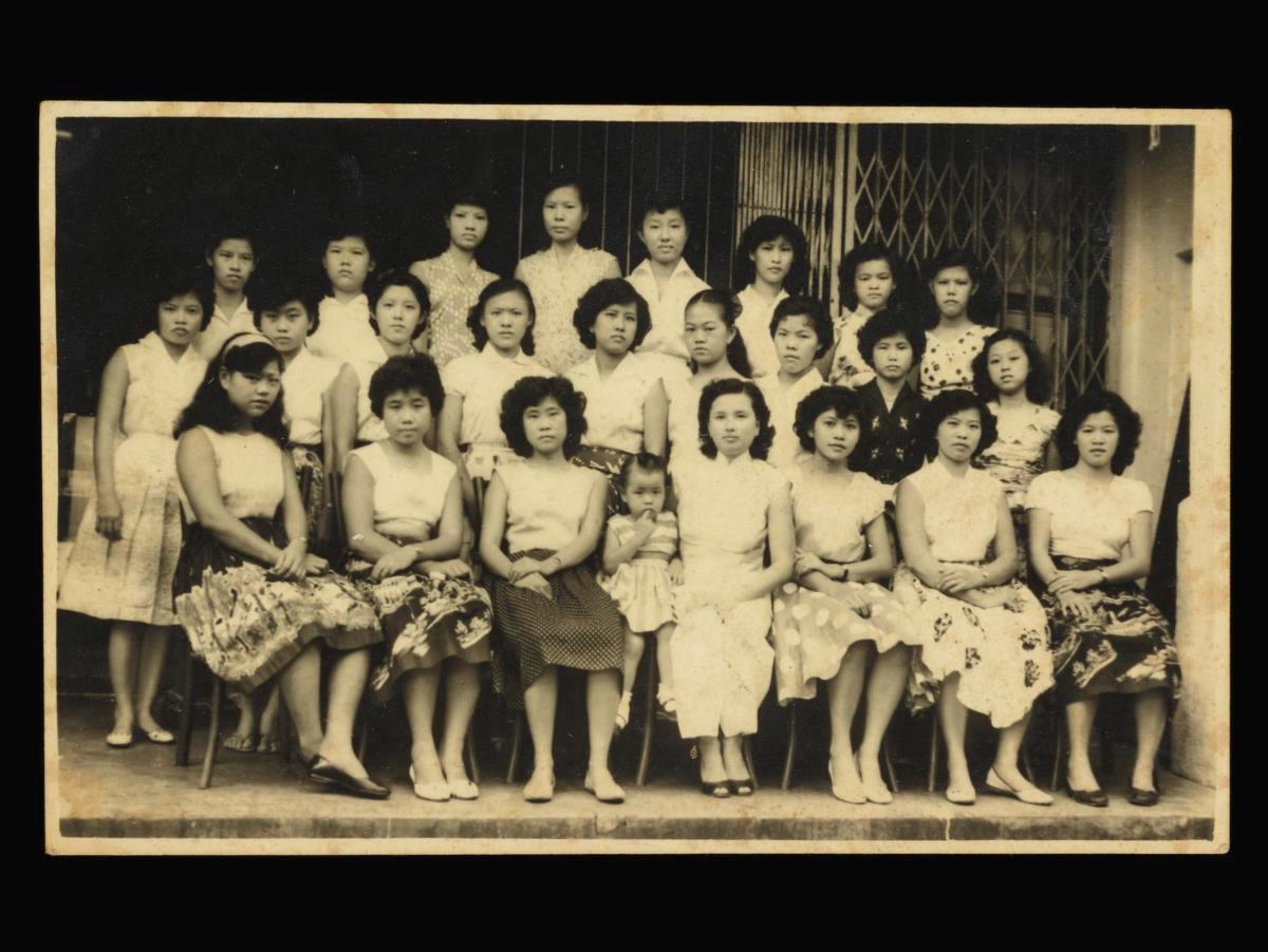 Photograph of students taken outside the Singapore Yi Ying Sewing and Embroidery Studio