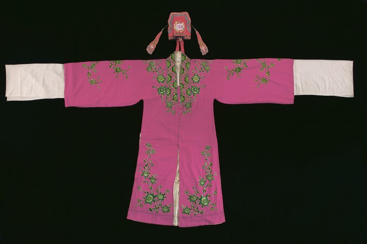 A set of pink costume with green floral motifs worn by a ‘wen xiao sheng’ in a Chinese opera