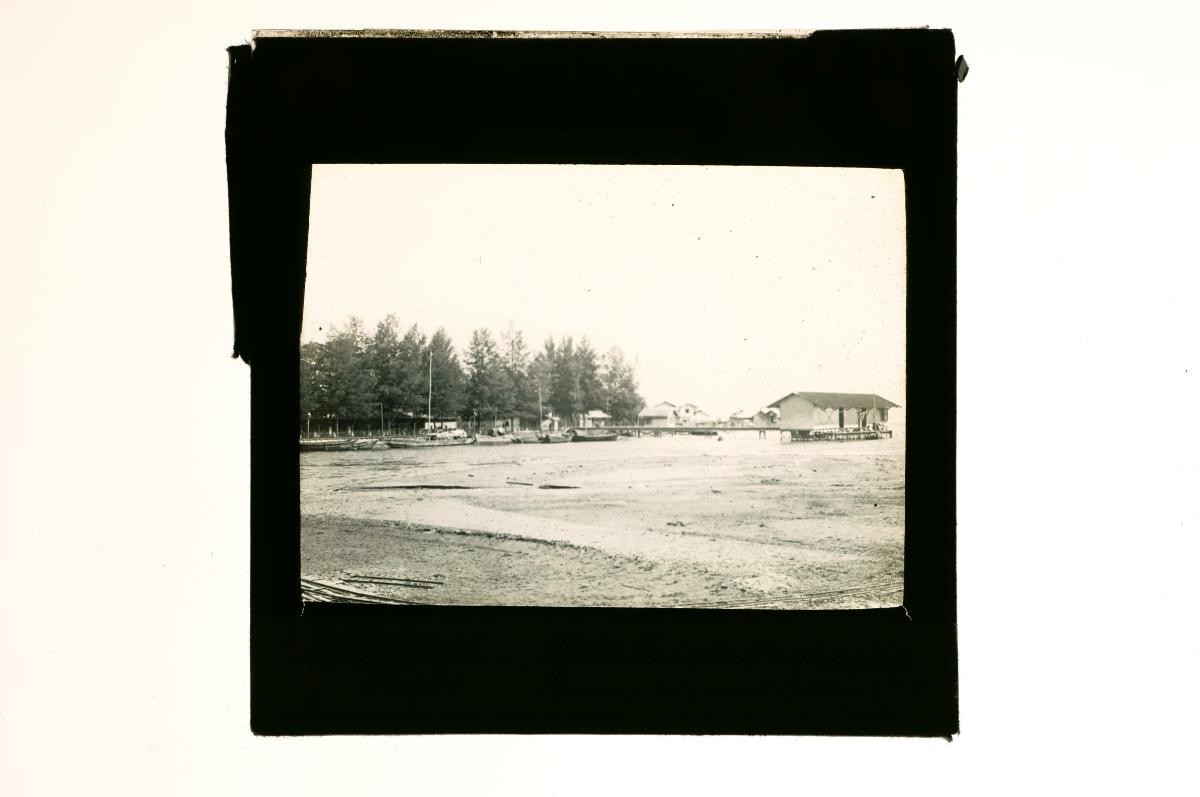 A glass lantern slide depicting a coastal scene