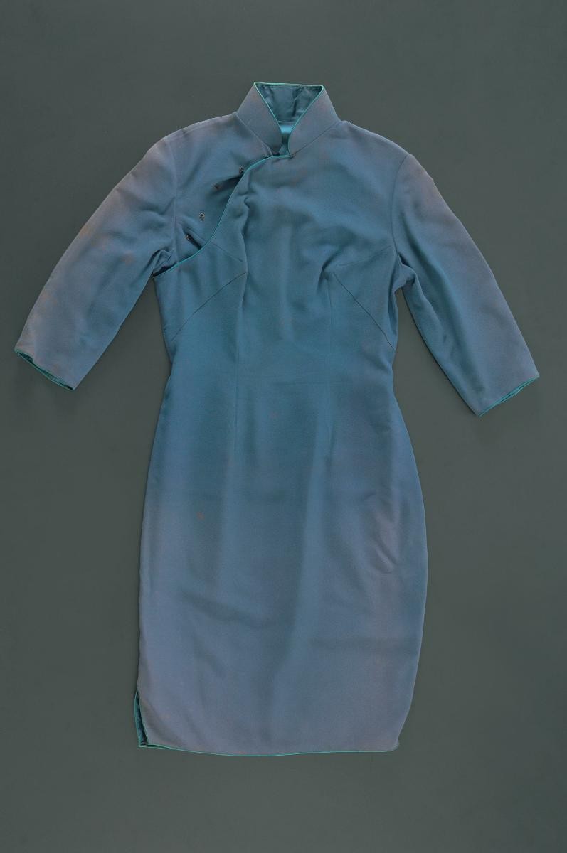 Blue knee length cheongsam with matching vest