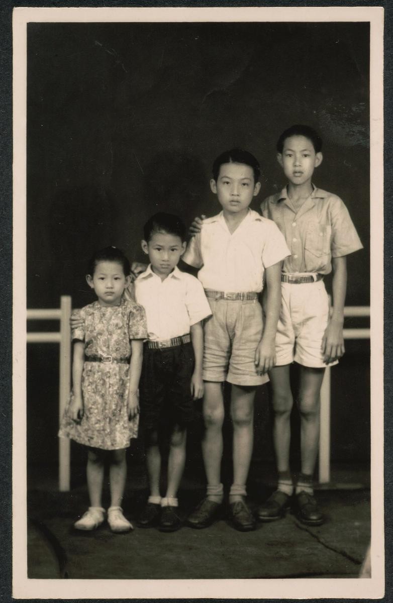 Studio portrait of four children