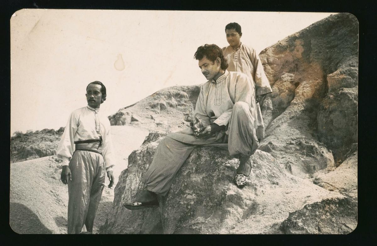 Nordin Ahmad (middle) and supporting cast in a scene from a film