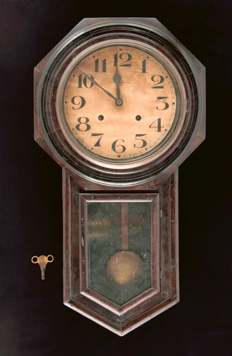 Regulator clock with key