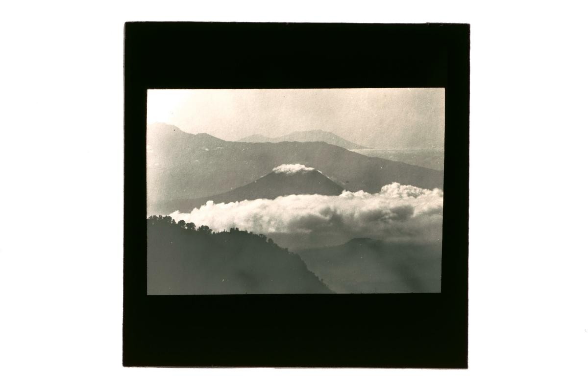 A glass lantern slide depicting a volcanic eruption