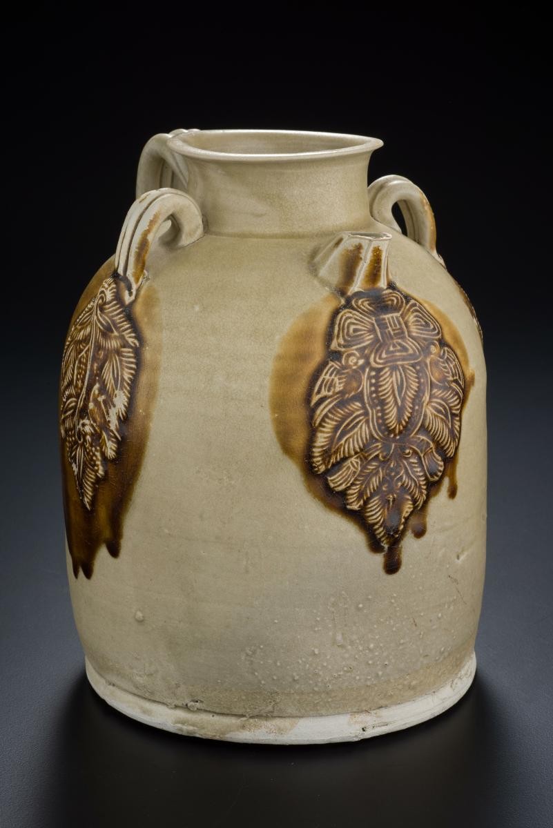 Ewer with palmettes and birds on a ribbon-tied bough