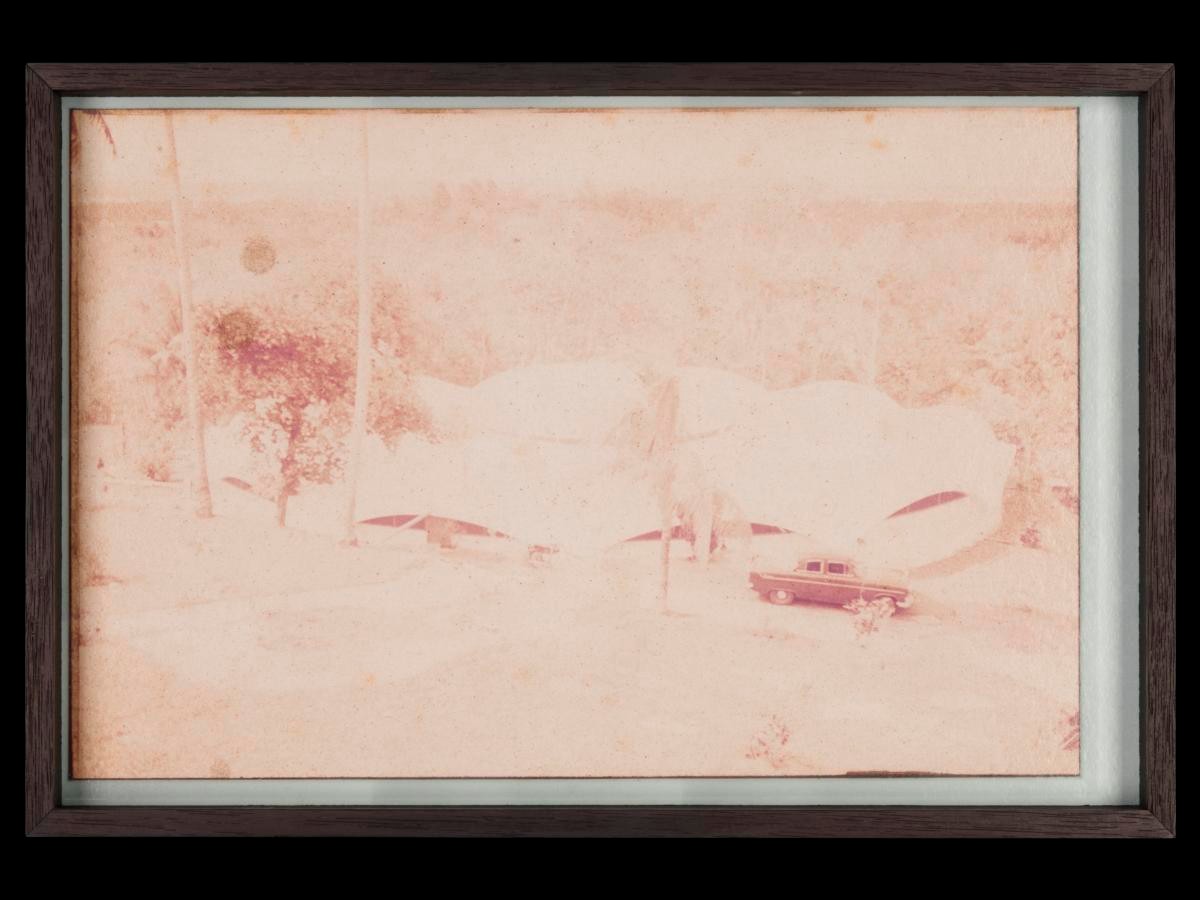 Untitled (car parked by building)