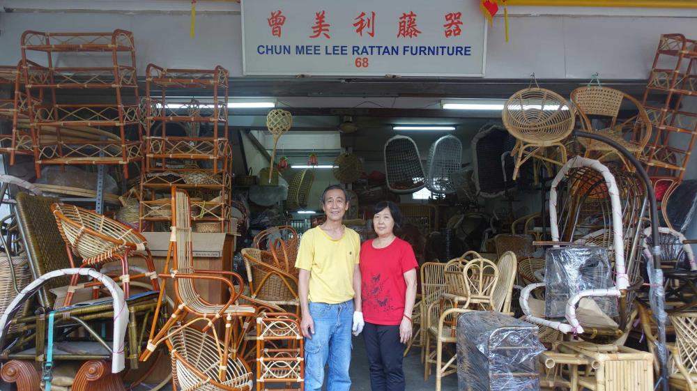 Mr Chen Foon Kee and his wife, Mdm Lee Joon, outside their shop