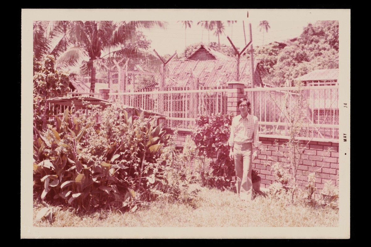Photograph of Quah Chin Siong, Danny, in the garden of his grandfather's residence