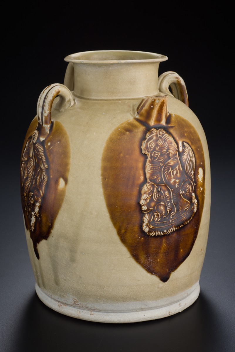 Ewer with palmettes and seated lion