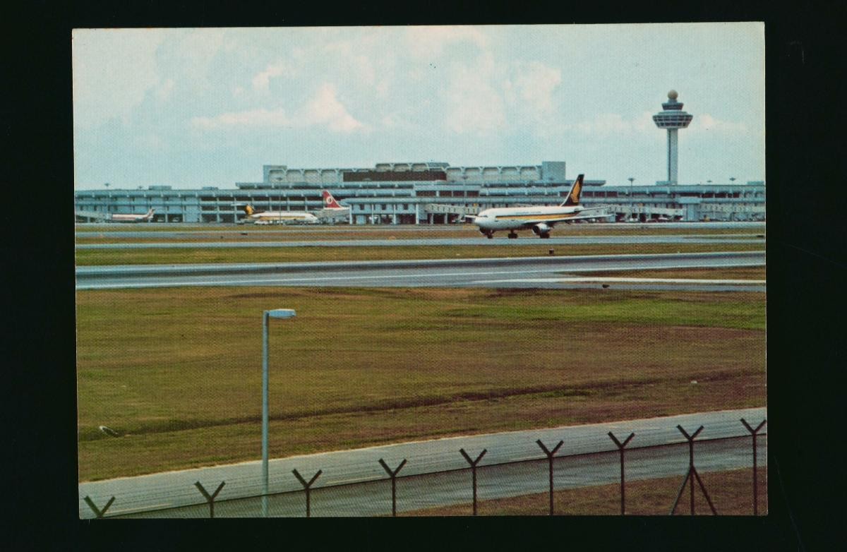 The Changi Airport control tower, Terminal One building and runway