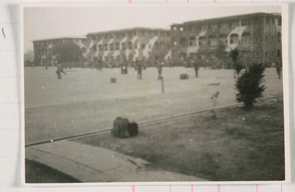 British soldiers gathering at a parade ground after the surrender of Japanese forces