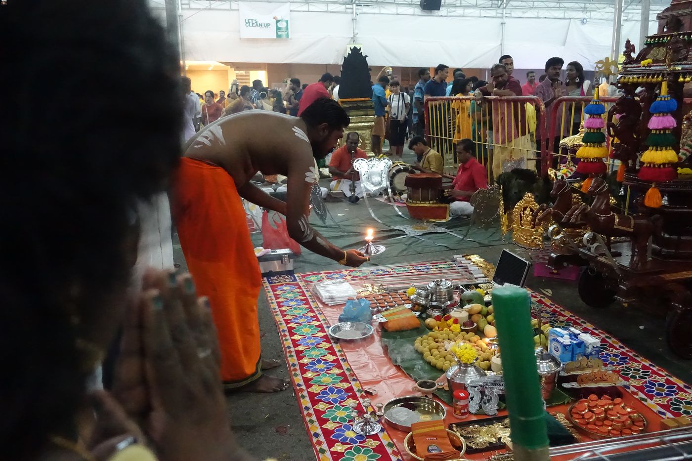 Mr Murali Raj making offerings at the Sri Srinivasa Perumal Temple before the Thaipusam procession begins.